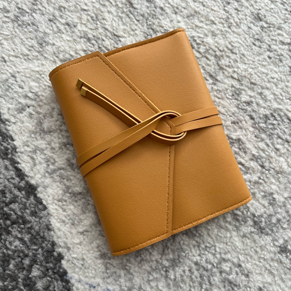 The Katherine Tech Organizer Roll mustard yellow make up travel organizer